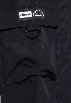 Ellesse EVERS TRACK PANT - Pantalon De Survêtement - Black -Ellesse Elegant Boutique 02f8990736e54e08855be593e2fee9c6