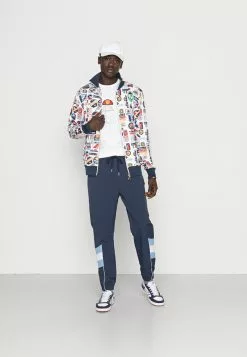 Ellesse MINUTI TRACK TOP - Pantalon De Survêtement - Navy -Ellesse Elegant Boutique 03af6067ea354d8097b991c142609524