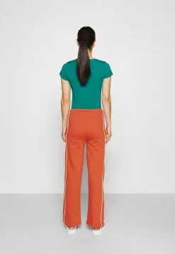 Ellesse AMITI PANT - Pantalon De Survêtement - Dark Orange -Ellesse Elegant Boutique 0f1b769fb155499c9b5e11be82f23b36