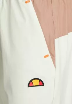 Ellesse HAESTEN TRACK PANT - Pantalon De Survêtement - Beige -Ellesse Elegant Boutique 14cb0e638c5f47f3aee57b49f633e2fa