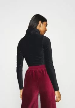 Ellesse LOISA - T-shirt à Manches Longues - Black -Ellesse Elegant Boutique 1f6e20dc83624d7cb19d6871a62959e3