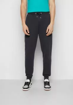 Ellesse SAMIE - Pantalon De Survêtement - Black -Ellesse Elegant Boutique 276cb927c98e49ac9c8c293c95dfcd46