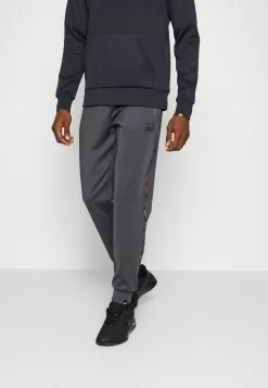 Ellesse RENSTO JOG SUIT - Survêtement - Dark Grey -Ellesse Elegant Boutique 2b3bf392d92143fa9c3b3f9567396807