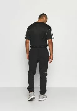 Ellesse CONDANNA TRACK PANT - Pantalon De Survêtement - Black -Ellesse Elegant Boutique 3387fb941fd248c389448486dce53a51