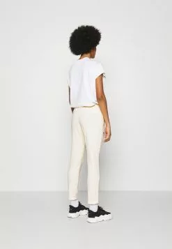 Ellesse ADALINA - Pantalon De Survêtement - Beige -Ellesse Elegant Boutique 47fc1359fd434410b2edf6ac9e316500