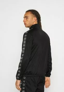 Ellesse RAYLO JOG SUIT - Survêtement - Black -Ellesse Elegant Boutique 499df43d129a4c92bc77094dc13d8232