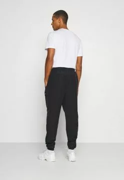 Ellesse STOREO - Pantalon De Survêtement - Black 7 Ellesse STOREO - Pantalon De Survêtement - Black -Ellesse Elegant Boutique 627f4ad095ab4b669f3b57d095a1531f