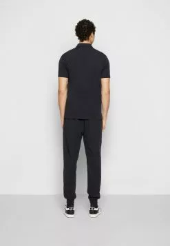 Ellesse NIAMA - Polo - Black 10 Ellesse NIAMA - Polo - Black -Ellesse Elegant Boutique 63123e55d1e346ecaad55e3d621e3af2