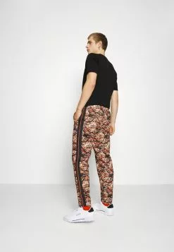 Ellesse NASCOSTO TRACK PANT - Pantalon De Survêtement - Cognac -Ellesse Elegant Boutique 6830166a8b43488a80a00b5325541458