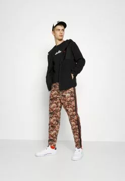 Ellesse NASCOSTO TRACK PANT - Pantalon De Survêtement - Cognac -Ellesse Elegant Boutique 6ad8fd31ba754e5fa8a2a7197991cd9d