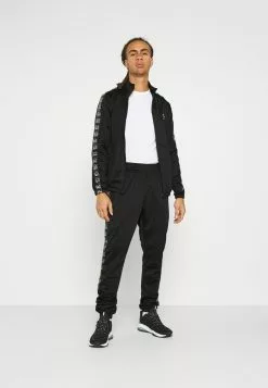 Ellesse RAYLO JOG SUIT - Survêtement - Black -Ellesse Elegant Boutique 750ec2efb21546a3be1ffcb584c68db8