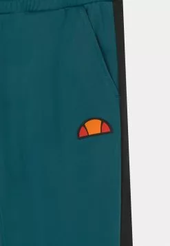 Ellesse PIOVEGA UNISEX - Pantalon De Survêtement - Teal/black -Ellesse Elegant Boutique 7c9926fbbba04aecb4d0eee59435e38c