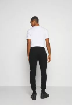 Ellesse GARNA - Pantalon De Survêtement - Black -Ellesse Elegant Boutique 7f0558037e9649e4a65e5f7f92245d39