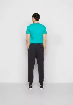 Ellesse SAMIE - Pantalon De Survêtement - Black -Ellesse Elegant Boutique 8c6d9be67b8d4a1ea4d07a0b219ba721