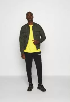 Ellesse NIORO - Pantalon De Survêtement - Black -Ellesse Elegant Boutique af8969f6154f4cf08fe866b732e557b7