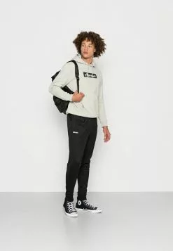 Ellesse BERTONI TRACK PANT - Pantalon De Survêtement - Black -Ellesse Elegant Boutique b85cc89c5c71420bb325a5b2b6cb61c9