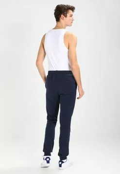 Ellesse OVEST - Pantalon De Survêtement - Dress Blues -Ellesse Elegant Boutique bf8de6ee8a944880910b6e4f5ab1fe4e