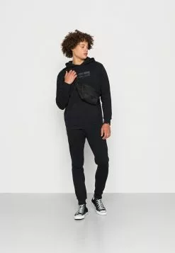 Ellesse MESE JOG SUIT - Pantalon De Survêtement - Washed Black -Ellesse Elegant Boutique c59ec10b2d5f4a88b6ba872f1bb993cd