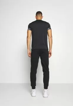Ellesse OSTERIA - Pantalon De Survêtement - Black -Ellesse Elegant Boutique f9b33fe92d5e4c9e9f5599c2cfe0f174