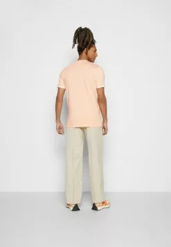 Ellesse MEDUNO - T-shirt Basique - Light Orange -Ellesse Elegant Boutique fb3e06ed95284319abf72be1d680e44f